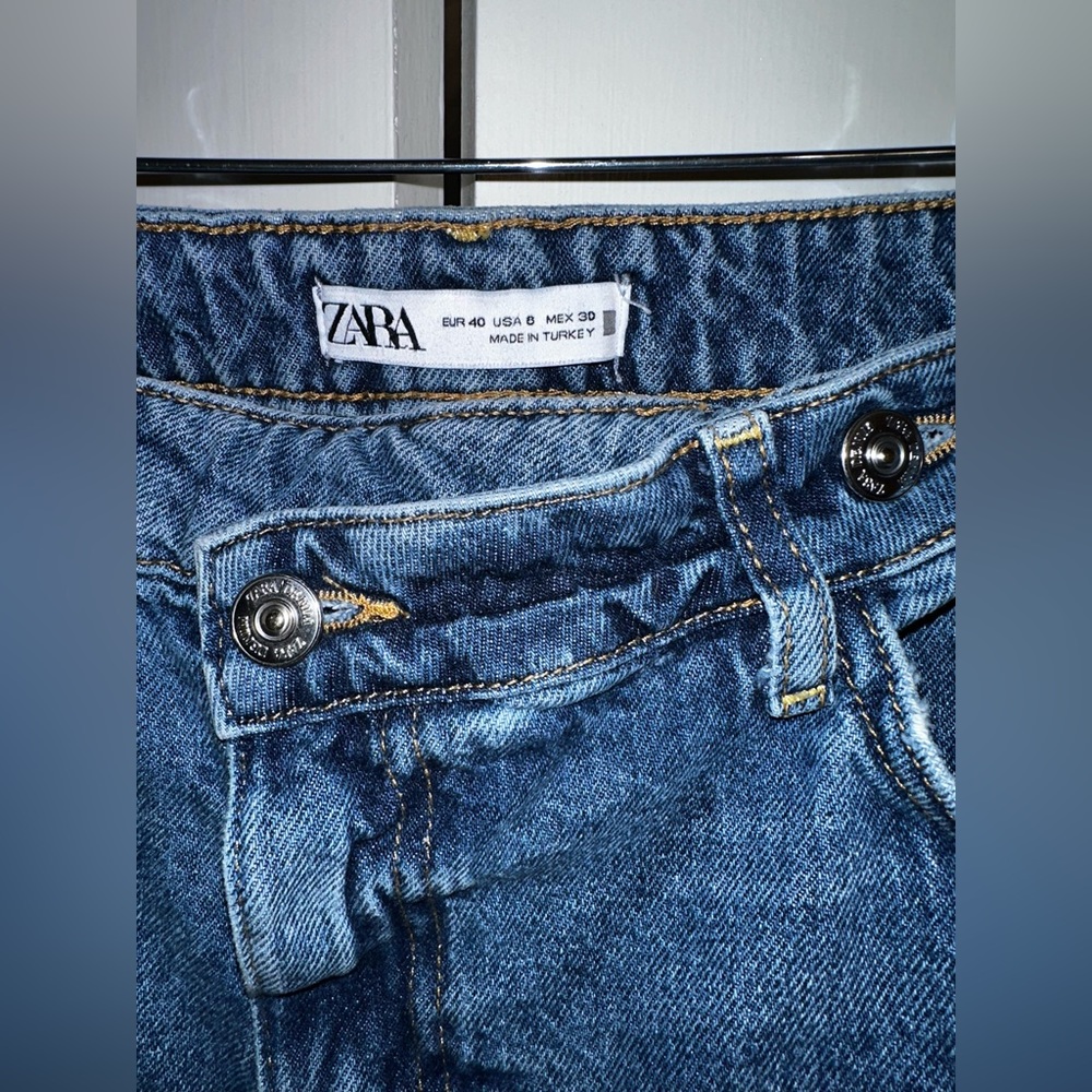 CROSS BUTTON JEANS FROM ZARA